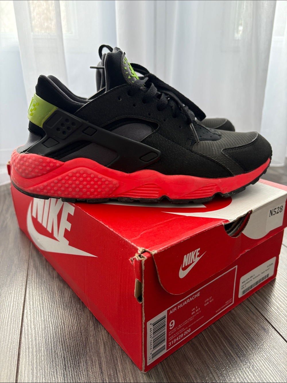 Nike Air Huarache Black Sneakers with Neon Pink Sole and Green Heel Accent - Picture 3 of 5